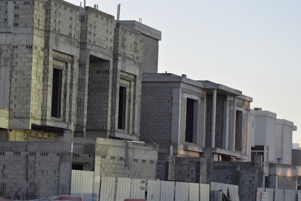 Houses under construction with wooden frames