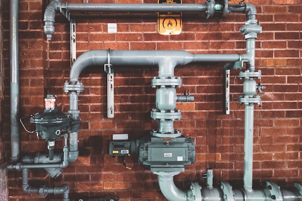 Industrial metal plumbing pipes in a building